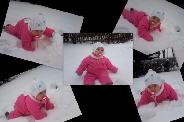 Lenka To są pierwsze zabawy Lenki na śniegu musiała dotknąć a nawet spróbować jak to smakuje.